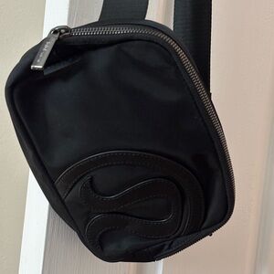 Black lululemon athletica belt bag. Black NWOT